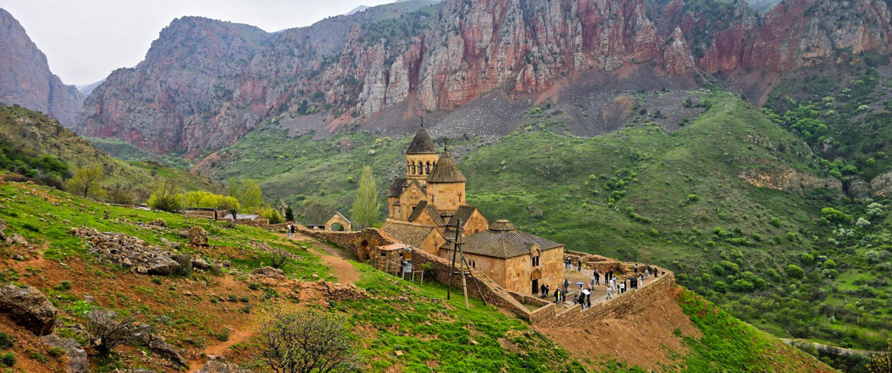 Wide landscape view of Noravank Monastery in the Armenian mountains