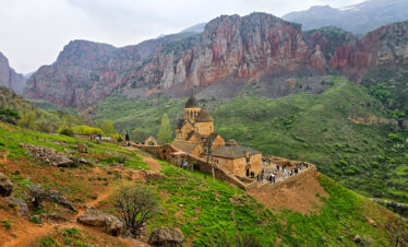 Wide landscape view of Noravank Monastery in the Armenian mountains