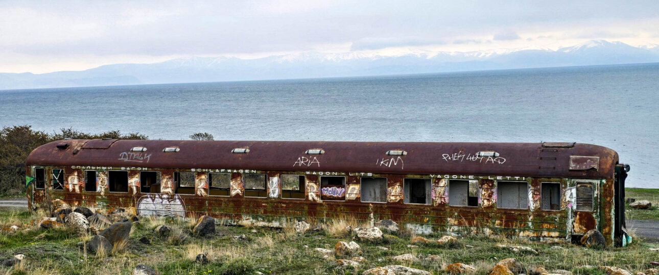 Abandoned old sleeping car beside Lake Sevan in Armenia
