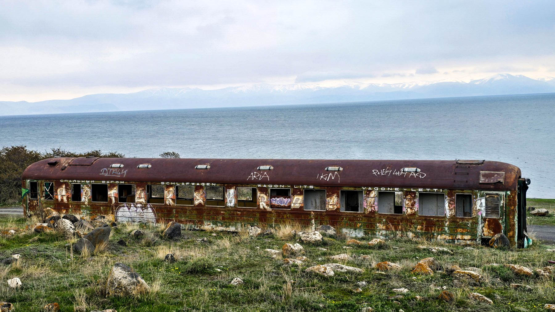 Abandoned old sleeping car beside Lake Sevan in Armenia